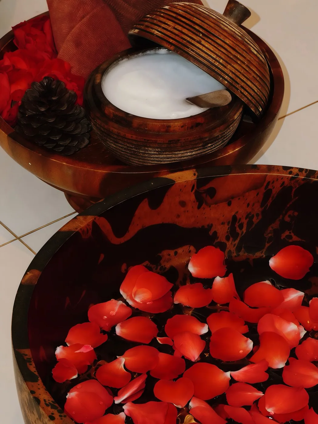 Welcome foot soak with rose petals and warm towel